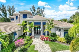 2 Story,Single Family Residence, 201 Caribbean Pelican Bay, FL 34108 