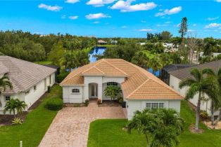 Ranch,Single Family Residence, 16409 Coco Hammock Coco Bay, FL 33908 