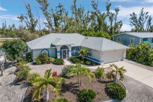 Ranch,Single Family Residence, 3852 Stabile St Jude Harbors, FL 33956 