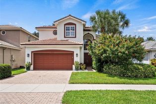 2 Story,Single Family Residence, 2375 Butterfly Palm Saturnia Lakes, FL 34119 