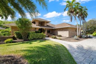 Ranch,Single Family Residence, 2376 Pine Woods Central Naples, FL 34105 